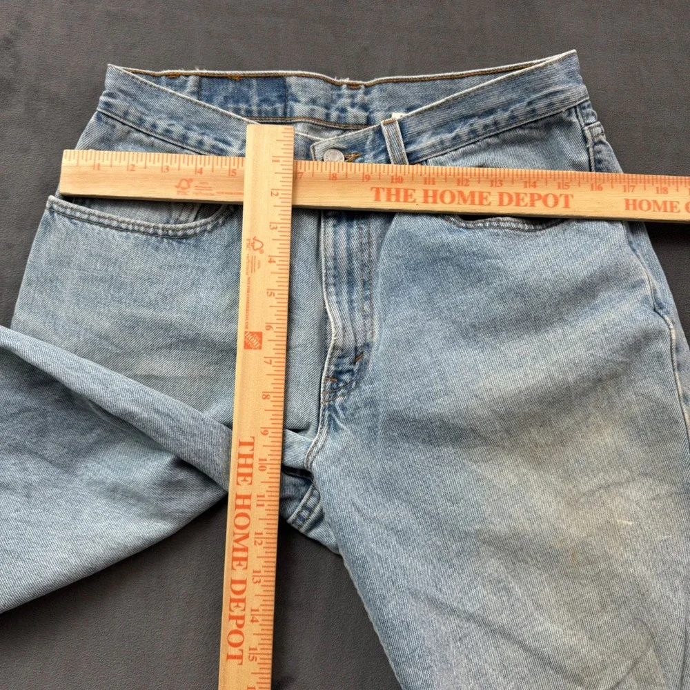 Vintage Levis 550 Relaxed Fit Jeans Light Wash Made in USA 33x34 Distressed